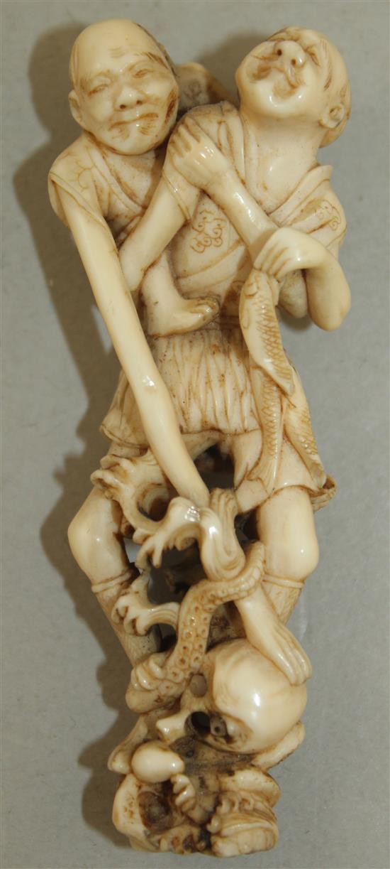 A Japanese ivory okimono of Ashinaga and Tenaga, Meiji period, 6.8cm